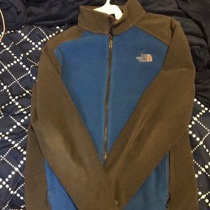 Blue and grey North Face fleece.